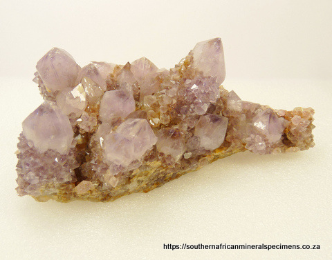 Light amethyst cactus quartz crystals on quartz matrix Light amethyst cactus quartz crystals on quartz matrix