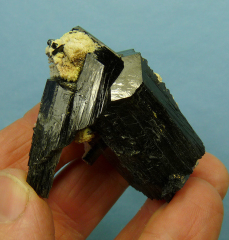Double terminated schorl crystal group with bits of feldspar Double terminated schorl crystal group with bits of feldspar