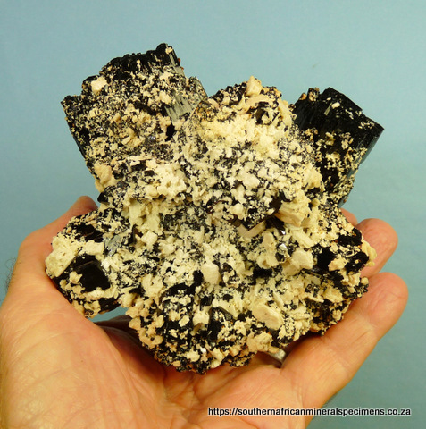 Schorl crystal group with feldspar sprinkling Schorl crystal group with feldspar sprinkling