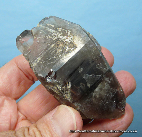 Double terminated smoky quartz crystal with inclusions Double terminated smoky quartz crystal with inclusions