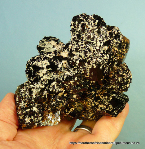Schorl crystal specimen with feldspar and iron oxide Schorl crystal specimen with feldspar and iron oxide
