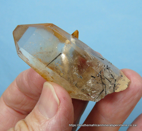 Quartz crystal with schorl inclusions Quartz crystal with schorl inclusions