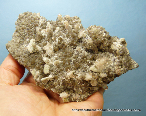 Quartz, calcite and chalcedony on matrix