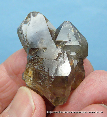 Smoky quartz crystal group with interesting faces Smoky quartz crystal group with interesting faces