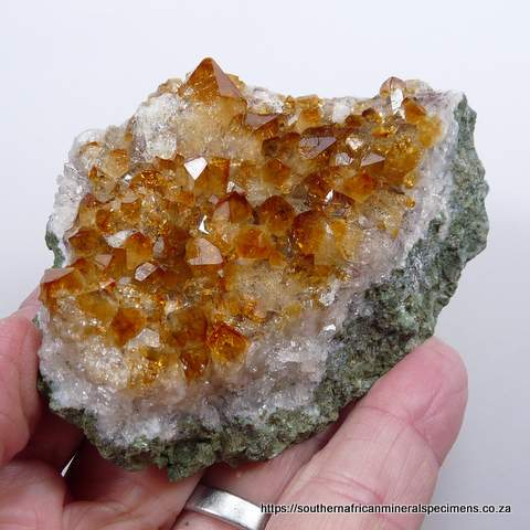 'Citrine' (heat-treated) quartz crystals on matrix