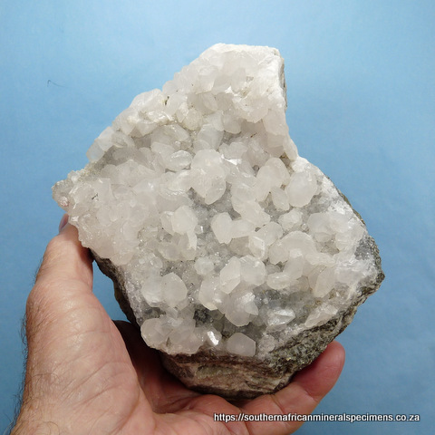 Calcite crystals on a pyrite / calcite matrix