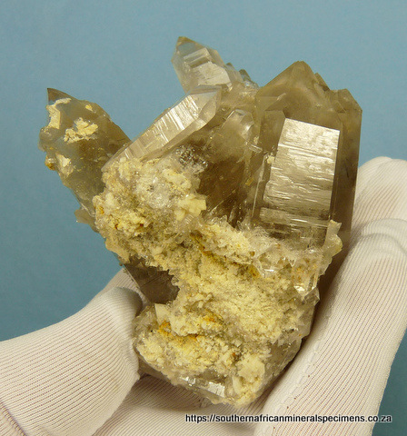 Light smoky quartz crystal group with rutile Light smoky quartz crystal group with rutile