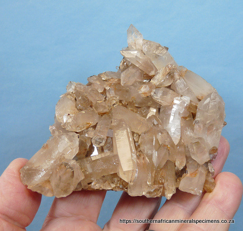 Plate of quartz crystals with underside having quartz crystals and goethite Plate of quartz crystals with underside having quartz crystals and goethite