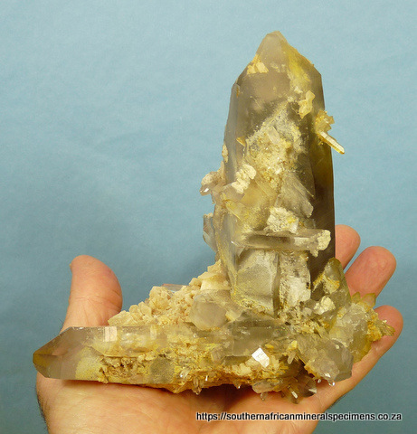 Smoky quartz crystals with dolomite and feldspar crystals Smoky quartz crystals with dolomite and feldspar crystals