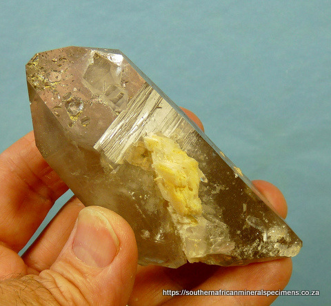 Quartz crystals with bits of goethite Quartz crystals with bits of goethite