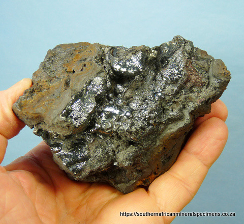 Shiny layer of hematite on iron ore Shiny layer of hematite on iron ore